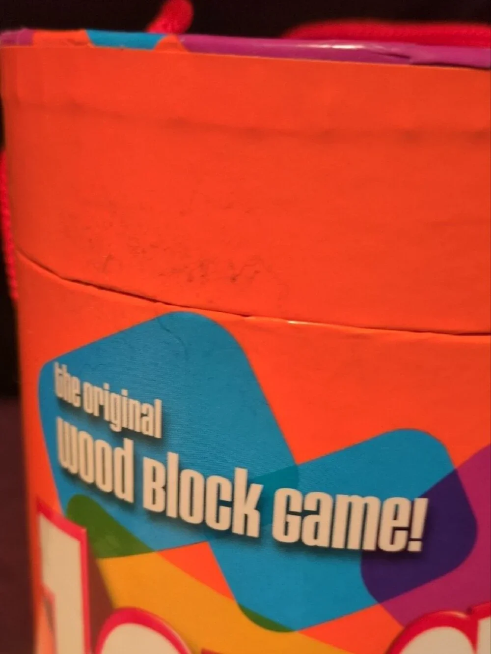 Hasbro Jenga Wooden Block Game - Orange Multicolor Tube- Tan Wooden Blocks